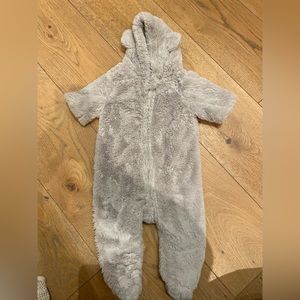 Newborn barefoot dreams onesie